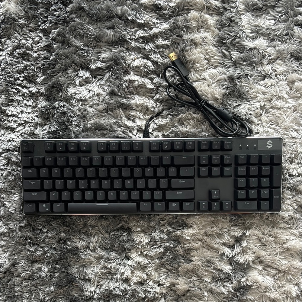 Brand new (no box) Rainbow light up gaming key board​